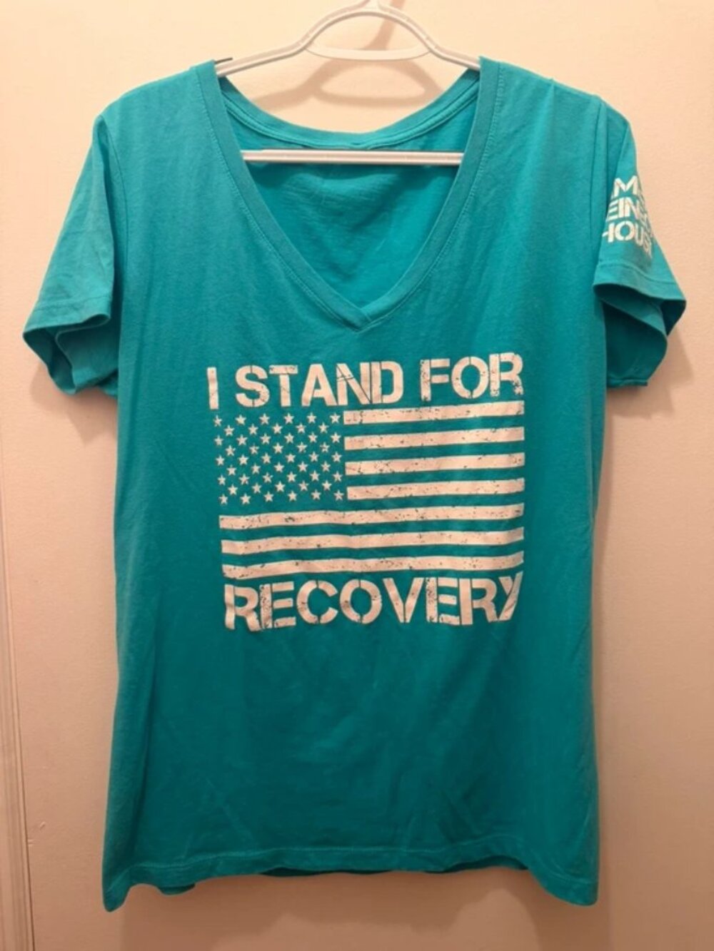 Amber Reineck House Women’s "I Stand For Recovery" Teal V-Neck Tee- Size L